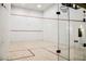 Squash court featuring glass door and wood flooring for the avid squash player at 220 E Flamingo Rd # 129, Las Vegas, NV 89169