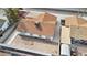 Aerial view of the backyard featuring the home's roof and landscaping, with privacy fence at 2236 E Hacienda Ave, Las Vegas, NV 89119