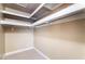 Walk in closet with simple shelving and neutral paint at 2251 Wigwam Pkwy # 923, Henderson, NV 89074