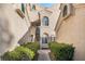 Inviting front entrance with well-maintained landscaping and exterior architecture at 2251 Wigwam Pkwy # 923, Henderson, NV 89074
