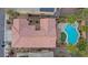 An aerial view of a home showcasing a pool, spa, and desert landscaping at 2445 Rue Royale, Henderson, NV 89044