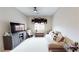 Cozy bonus room featuring a television, comfortable seating, and ample storage space for relaxation at 2539 Ballatore St, Henderson, NV 89044