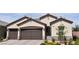 Charming single-story home featuring a two-car garage, desert landscaping, and a gated front entry at 2539 Ballatore St, Henderson, NV 89044