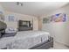 Bedroom with a neutral color palette and ample natural light, offering a cozy retreat at 2901 Bahama Yellow Ave, North Las Vegas, NV 89086