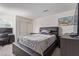Bedroom with a neutral color palette and ample natural light, offering a cozy retreat at 2901 Bahama Yellow Ave, North Las Vegas, NV 89086