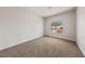 Bedroom features neutral carpeting and a window at 3033 Bonnie Rock Dr, Las Vegas, NV 89134