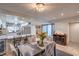 Open floor plan featuring a modern dining area flowing into the kitchen at 3053 Conquista Ct, Las Vegas, NV 89121