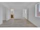 Spacious bedroom features light wood-look flooring and ensuite bath and closet at 3525 Hammock St, Las Vegas, NV 89147