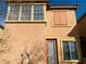 Exterior shot showcasing stucco and a decorative window on the second story at 3525 Hammock St, Las Vegas, NV 89147