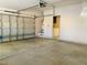 Spacious two car garage with utility appliances and overhead door at 3525 Hammock St, Las Vegas, NV 89147
