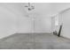 Large, clean garage with smooth concrete floor and overhead lighting at 3525 Hammock St, Las Vegas, NV 89147