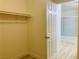 Walk-in closet with a basic rod and shelf, offering plenty of storage at 3525 Hammock St, Las Vegas, NV 89147