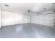 Spacious, freshly painted garage with sealed concrete floors and an automatic garage door opener at 3645 E Viking Rd, Las Vegas, NV 89121