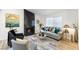 Cozy living room with a modern fireplace, comfortable seating, and elegant decor at 3645 E Viking Rd, Las Vegas, NV 89121