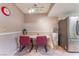 Charming dining area features a cozy table and chairs adjacent to the kitchen appliances at 3744 Archer St, Las Vegas, NV 89108