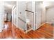 Hallway featuring hardwood flooring and closet with sliding mirrored doors at 3744 Archer St, Las Vegas, NV 89108