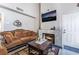 Cozy living room with a decorative fireplace, comfortable seating, and modern decor at 3744 Archer St, Las Vegas, NV 89108