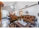 Inviting living room with comfortable seating, staircase, and stylish decor at 3744 Archer St, Las Vegas, NV 89108