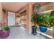 Charming porch with potted plants and comfortable seating area, creating a welcoming entrance at 3744 Archer St, Las Vegas, NV 89108
