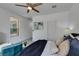 Well-lit bedroom with a view, comfortable bed, and stylish decor, providing a tranquil and inviting atmosphere at 5029 Alfingo St, Las Vegas, NV 89135