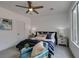 Charming bedroom with bedside tables, lamps, and a cozy chair, perfect for relaxing and unwinding at 5029 Alfingo St, Las Vegas, NV 89135