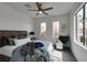 Serene bedroom with neutral tones, large windows, and a comfortable bed, creating a relaxing retreat at 5029 Alfingo St, Las Vegas, NV 89135