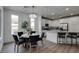 Cozy dining area with modern lighting, sleek chairs, and neutral decor at 5029 Alfingo St, Las Vegas, NV 89135