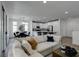 Spacious living area with an open layout connecting to dining and kitchen at 5029 Alfingo St, Las Vegas, NV 89135