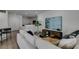 Well-lit living room showcases the open layout with modern décor and comfortable seating at 5029 Alfingo St, Las Vegas, NV 89135