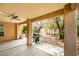 Covered patio with a built-in grill and spacious seating area, ideal for outdoor entertaining and relaxation at 5029 Alfingo St, Las Vegas, NV 89135