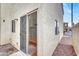Backyard patio with sliding glass door to the interior at 5246 Aurora Beam Ave, Las Vegas, NV 89122