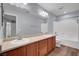 Bathroom featuring dual sinks, shower and lots of counter space at 5246 Aurora Beam Ave, Las Vegas, NV 89122
