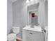 Clean and modern bathroom featuring a white vanity and fixtures, ideal for relaxation at 5246 Aurora Beam Ave, Las Vegas, NV 89122