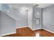 Spacious living room featuring neutral paint, natural light and hardwood flooring at 5246 Aurora Beam Ave, Las Vegas, NV 89122