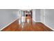 Spacious living room with gleaming hardwood floors and plenty of natural light at 5246 Aurora Beam Ave, Las Vegas, NV 89122