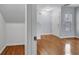 The Living Room features beautiful hardwood floors with a light and bright neutral wall color at 5246 Aurora Beam Ave, Las Vegas, NV 89122
