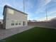 Backyard featuring artificial turf and patio, perfect for outdoor gatherings and relaxation at 5691 Tinar St, Las Vegas, NV 89113