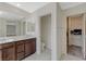 Bathroom with double vanity, walk-in closet and a separate toilet room for convenience at 5691 Tinar St, Las Vegas, NV 89113