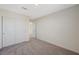 Bedroom features a closet with sliding doors, plush carpeting, and natural light for a cozy atmosphere at 5691 Tinar St, Las Vegas, NV 89113
