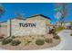 Stone community sign in a landscaped area marking the entrance to Tustin neighborhood at 5691 Tinar St, Las Vegas, NV 89113