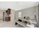 Bright dining room with a modern concrete table and minimalist decor at 5691 Tinar St, Las Vegas, NV 89113