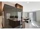 Open kitchen featuring stainless steel appliances and an island with a sink and seating at 5691 Tinar St, Las Vegas, NV 89113
