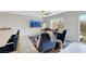 Cozy living room with elegant seating and access to the outdoor patio at 6619 Frosted Harvest Ave, Las Vegas, NV 89108