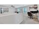Loft area featuring two windows, desk space and carpet at 6619 Frosted Harvest Ave, Las Vegas, NV 89108