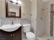 Bathroom featuring marble countertops, a shower, and modern fixtures, creating a relaxing and stylish space at 738 Panhandle Dr, Henderson, NV 89014