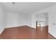 A bedroom with wood floors and access to the upper level at 738 Panhandle Dr, Henderson, NV 89014