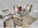 Aerial view showcasing the entryway with staircase, living room, and dining area at 738 Panhandle Dr, Henderson, NV 89014