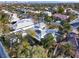 This aerial view shows the surrounding neighborhood and lush landscape at 7436 Oak Grove Ave, Las Vegas, NV 89117