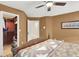 This bedroom has a walk-in closet and neutral walls at 7436 Oak Grove Ave, Las Vegas, NV 89117
