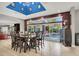 Bright dining area with hardwood floors and sliding door access to outdoor living at 7436 Oak Grove Ave, Las Vegas, NV 89117